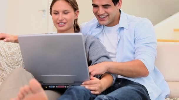 Couple with a laptop — Stock Video