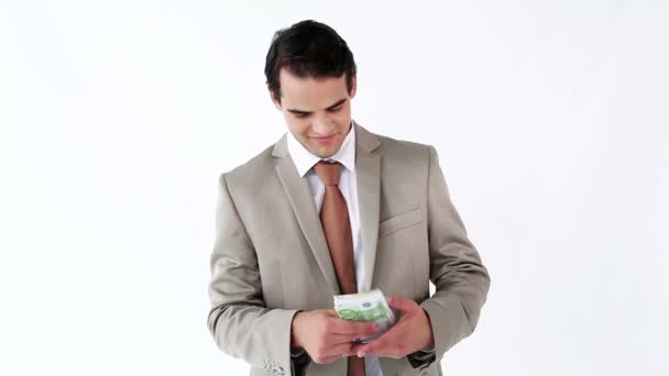 Счастливый руководитель, держащий в руках веер банкнот — стоковое видео