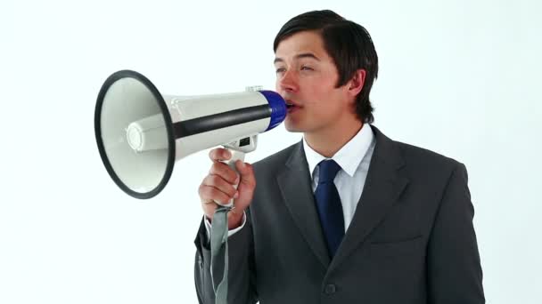 Smiling man talking with a megaphone — Stock Video