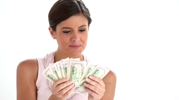 Woman holding a fan of dollars — Stock Video