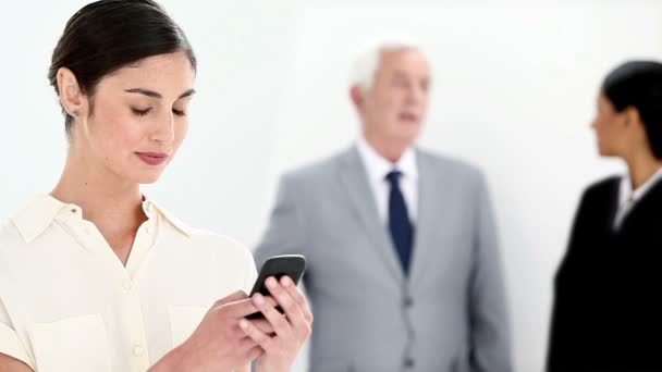 Businesswoman typing a text message — Stock Video