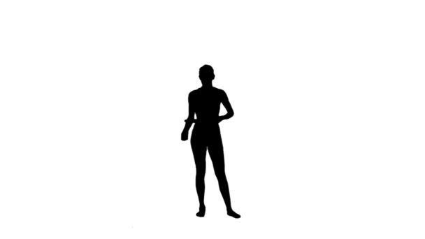 Silhouette of a woman playing tennis — Stock Video