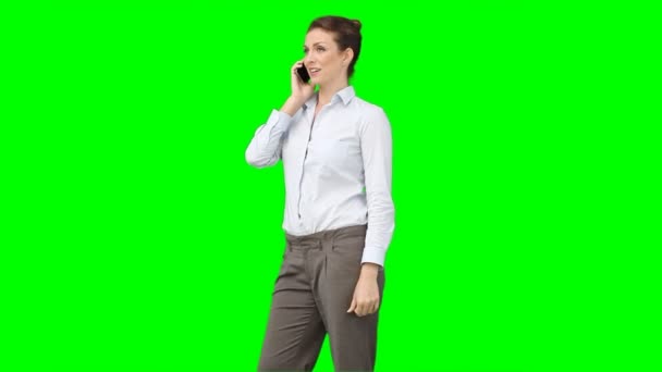 A business woman talks on her mobile phone — Stock Video