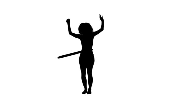 Silhouette donna utilizzando un hula hoop — Video Stock