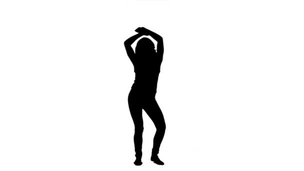 Silhouette woman dancing on her own — Stock Video