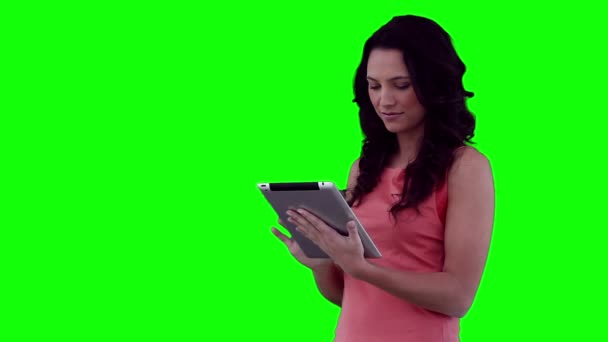 Woman happily using a tablet computer — Stock Video