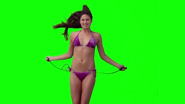 Woman using a skipping rope — Stock Video