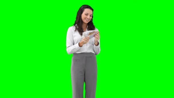 一个女人抱着钱笔记的粉丝 — 图库视频影像