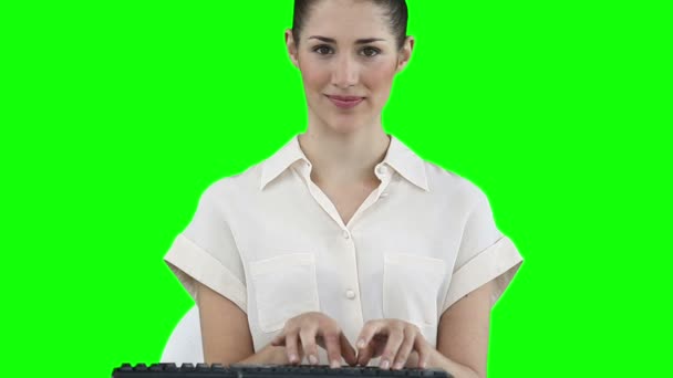 Businesswoman typing on a keyboard — Stock Video