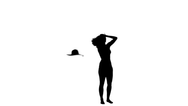 Silhouette woman's hat in blown off — Stock Video