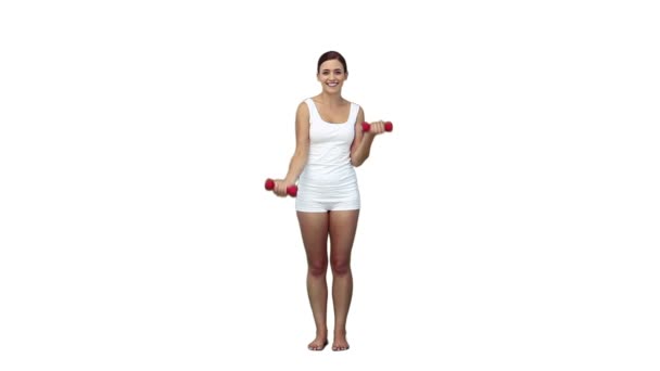 A woman exercises with hand weights — Stock Video