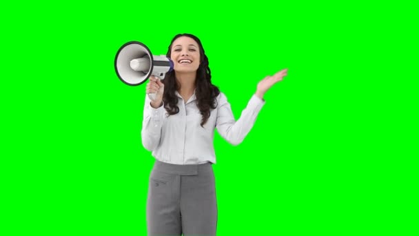 A woman using a megaphone to talk — Stock Video