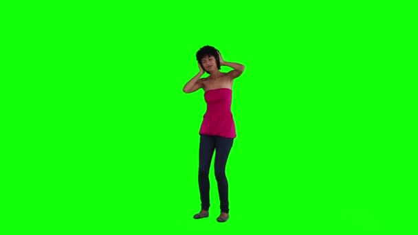 A woman holding her head is dancing — Stock Video