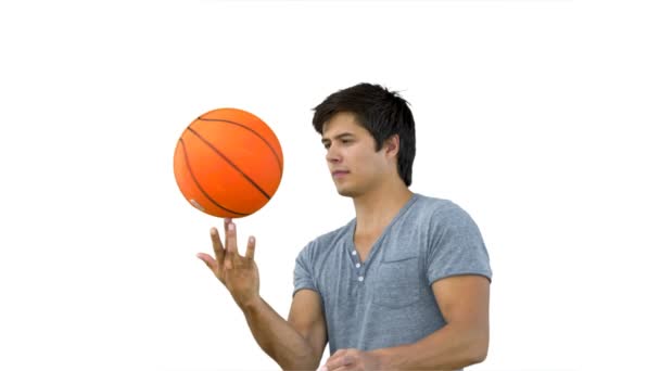 Hombre girando una pelota en su dedo en cámara lenta — Vídeo de stock