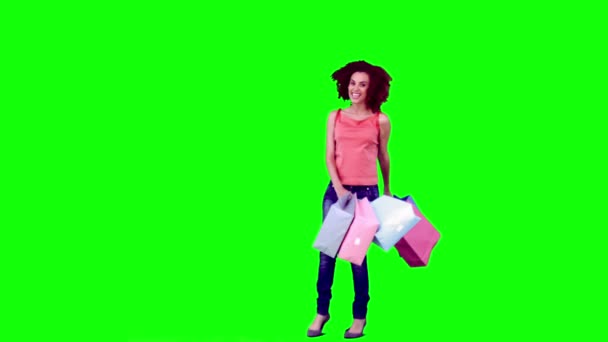 Woman in slow motion holding shopping bags — Stock Video