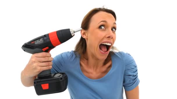 Brunette woman holding a drill — Stock Video