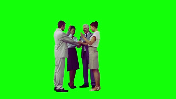 Equipe sorridente em câmera lenta unindo as mãos — Vídeo de Stock