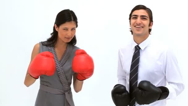 Smiling friends using boxing gloves — Stock Video