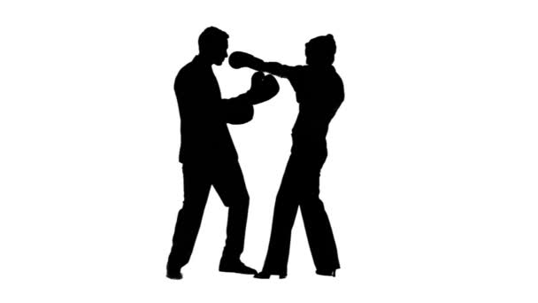 Two colleagues in slow motion boxing — Stock Video