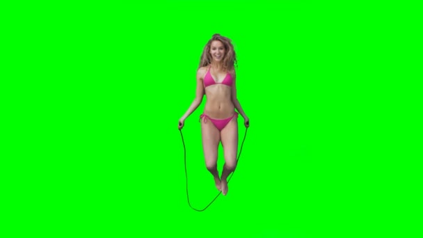 Woman skipping over a rope — Stock Video