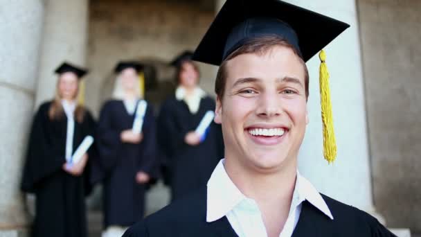 Happy students standing behind a friend — Stock Video