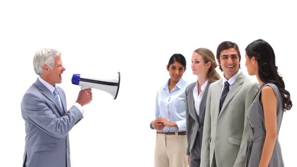 Boss shouting with a megaphone at his employees — Stock Video