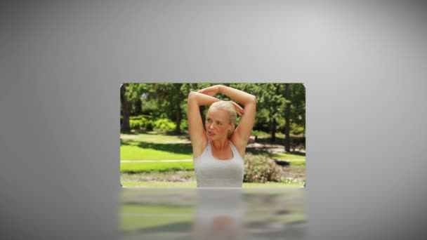 Woman working out in a park — Stock Video