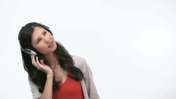 Woman listening while dancing — Stock Video