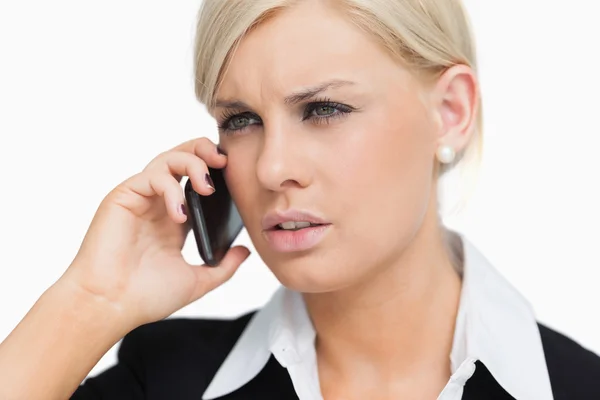 Serious blond businesswoman on the phone — Stock Photo, Image