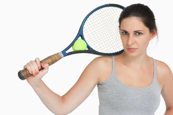 Sportswoman with a tennis racket — Stock Photo, Image
