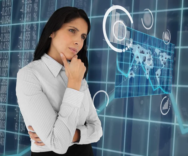 Woman standing thinking and looking at world map — Stock Photo, Image