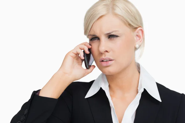 Serious blonde businesswoman on the phone — Stock Photo, Image