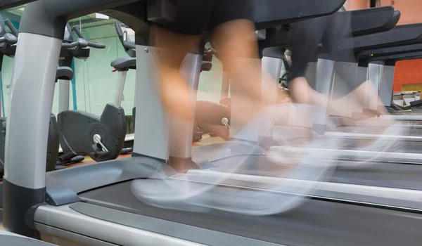 Jogging on a treadmill — Stock Photo, Image