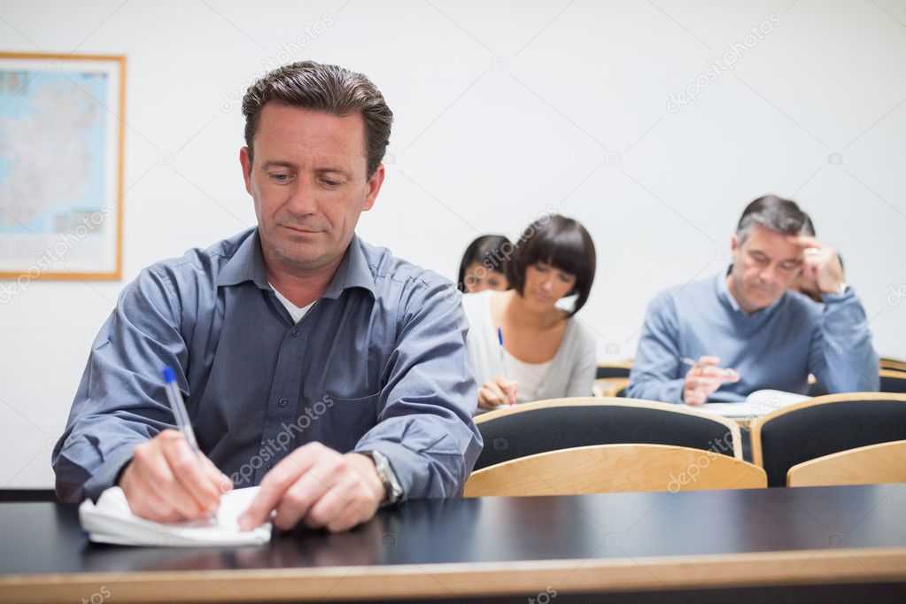 Adults in the classroom — Stock Photo © Wavebreakmedia #23047698