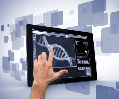 Man pointing at DNA interface on digital tablet clipart