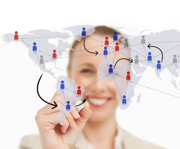 Woman drawing links on the world map — Stock Photo, Image