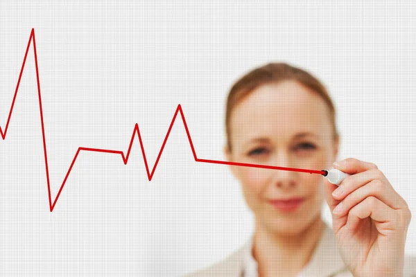 Businesswoman with a whiteboard marker — Stock Photo, Image