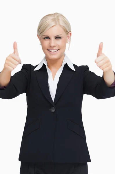 Smiling blond businesswoman thumbs-up — Stock Photo, Image