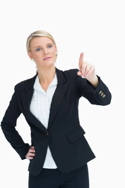 Woman presenting while pointing — Stock Photo, Image