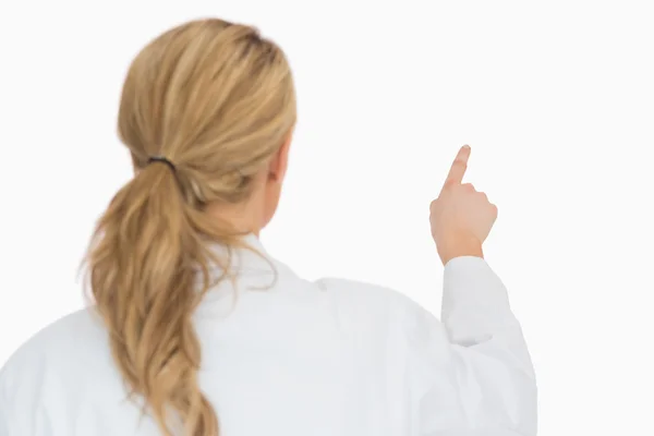 Doctor pointing from behind — Stock Photo, Image