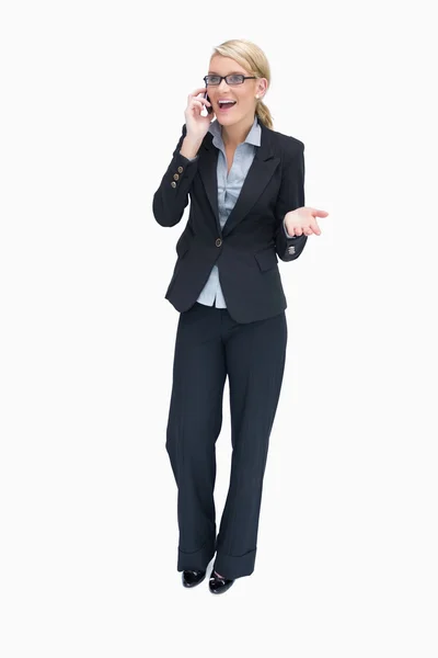 Happy businesswoman on mobile phone — Stock Photo, Image