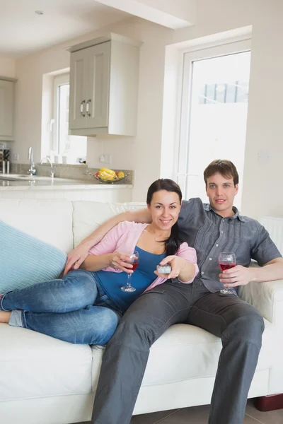 Young relaxing couple in the living room — Stock Photo, Image