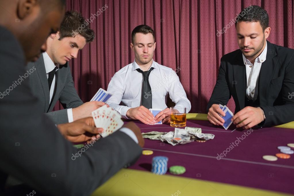 depositphotos_23086564-stock-photo-men-playing-high-stakes-poker.jpg