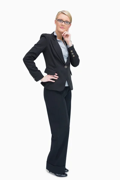 Businesswoman considering while standing — Stock Photo, Image