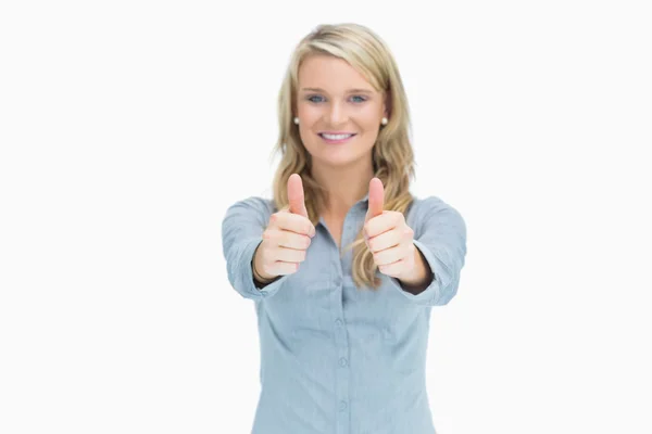 Blonde woman cheerfully doing thumbs up — Stock Photo, Image