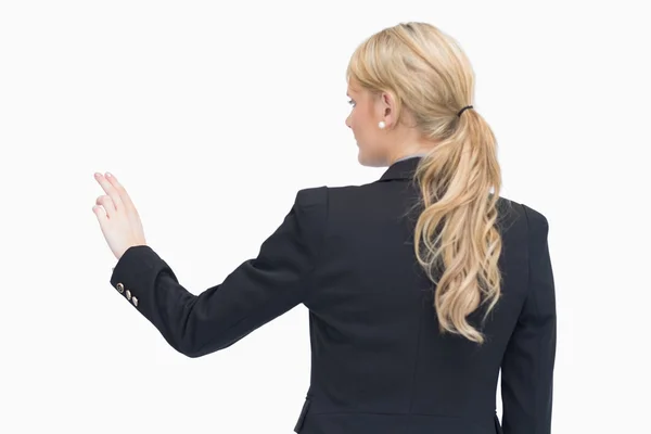 Businesswoman pointing something out — Stock Photo, Image