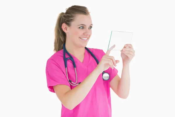 Doctor selecting something on clear pane — Stock Photo, Image