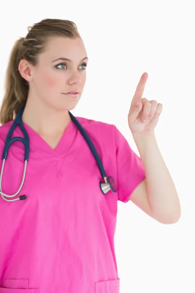 Doctor pointing to something — Stock Photo, Image