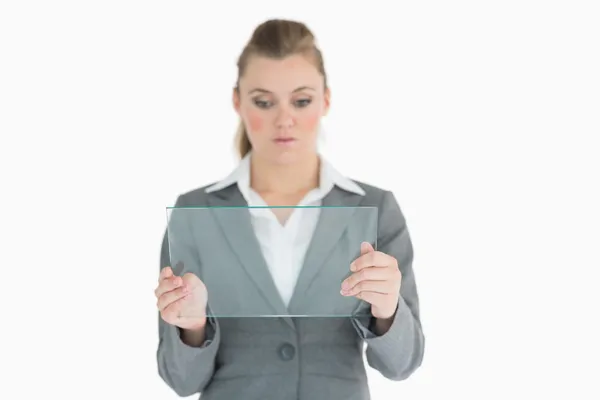 Businesswoman holding a glass slide — Stock Photo, Image