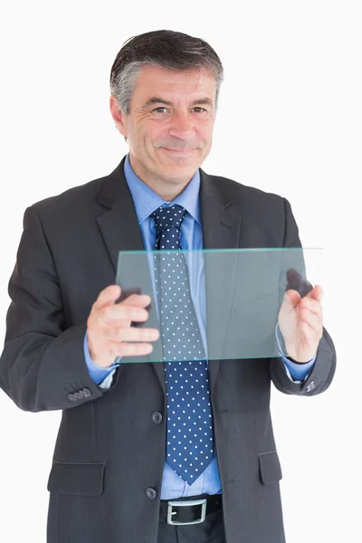 Cheerful man holding a pane — Stock Photo, Image